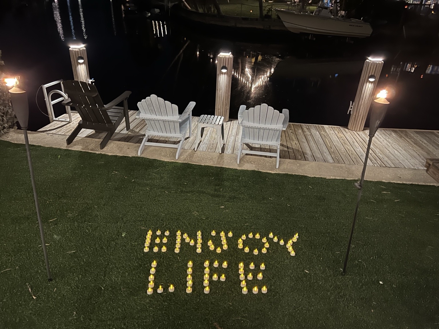 A candlelit message beside the water says it all: slow down, take it in and enjoy the life you’re sharing.